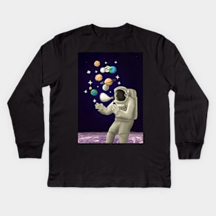 An astronaut on the moon plays with the planets like soap bubbles Kids Long Sleeve T-Shirt